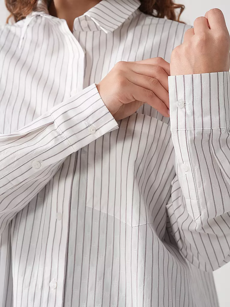 ANINE BING | Bluse BRAXTON
Marke: ANINE BING
Farbe: weiss
Kategorien: Mode,Damen

Ärmellänge: Langarm
Material: Viskose ,Stretch
Kragenform: Hemdblusenkragen
Musterung: Unifarben
Passform (Oberbekleidung): Locker
Stil: Pure
Details: Raffung,Falten | 