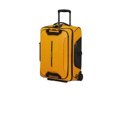 Valigia gialla con maniglie e dettagli neri, in posizione verticale su due ruote con maniglia telescopica estesa.