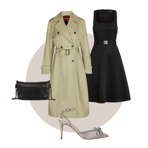 Un outfit elegante composto da un trench beige, un abito nero senza maniche, una pochette nera e décolleté beige eleganti con dettaglio a fiocco.