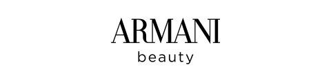 Testo nero su sfondo bianco mostra il logo "Armani Beauty", con "ARMANI" in grandi lettere maiuscole e "Beauty" in lettere minuscole più piccole sotto.