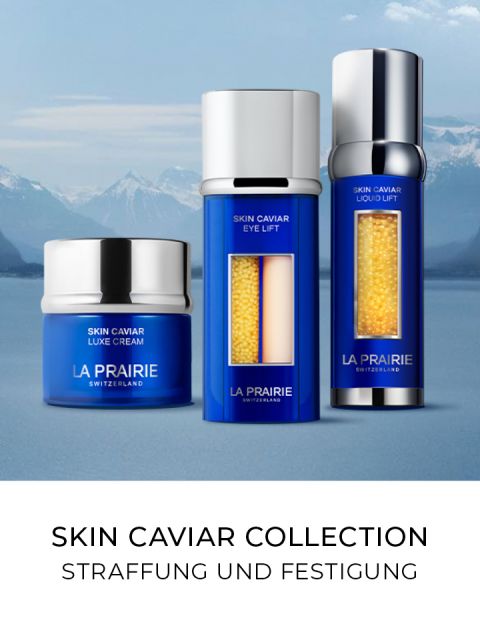 Tre flaconi blu per la cura della pelle della collezione Skin Caviar di La Prairie presentati su uno sfondo montano. Il testo recita: "Collezione Skin Caviar Rassodare e Tonificare".