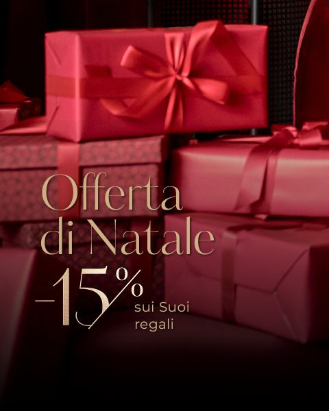 Scatole regalo rosse con nastri e il testo "Offerta di Natale -15% sui Suoi regali", che indica uno sconto natalizio del 15% sui regali.