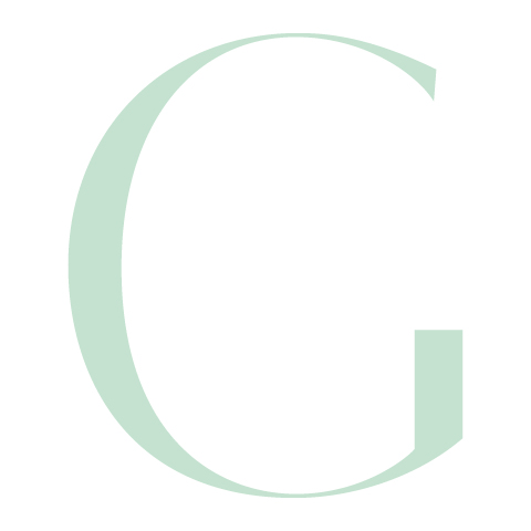 Una grande lettera maiuscola "G" verde chiaro su sfondo bianco.