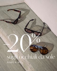 Tre paia di occhiali da sole su cemento con testo sovrapposto: "-20% sugli occhiali da sole. Scopri di più.".