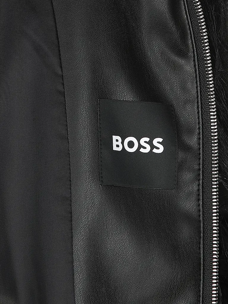 BOSS | Nome prodotto: Giacca in pelliccia sintetica CECOOL
Marca: BOSS
Colore: nero
Categorie: Moda,Donna

Lunghezza manica: Manica lunga
Materiale: Pelliccia sintetica,Poliestere / Poliammide
Tipo di colletto: Collo alto
Motivo: Tinta unita
Vestibilità (capisp | 