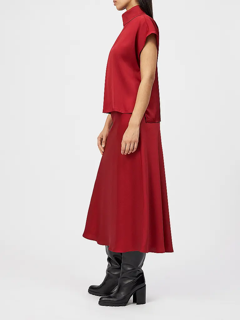 DRYKORN | Nome prodotto: Blusa ALARIA 1
Marca: DRYKORN
Colore: rosso
Categorie: Moda,Donna

Lunghezza manica: Manica corta
Materiale: Fibra sintetica,Stretch
Tipo di colletto: Collo alto
Motivo: Tinta unita
Vestibilità (capispalla): Ampia
Stile: Pure,Trend
Dettagl | 