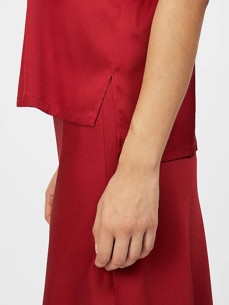 DRYKORN | Nome prodotto: Blusa ALARIA 1
Marca: DRYKORN
Colore: rosso
Categorie: Moda,Donna

Lunghezza manica: Manica corta
Materiale: Fibra sintetica,Stretch
Tipo di colletto: Collo alto
Motivo: Tinta unita
Vestibilità (capispalla): Ampia
Stile: Pure,Trend
Dettagl | 