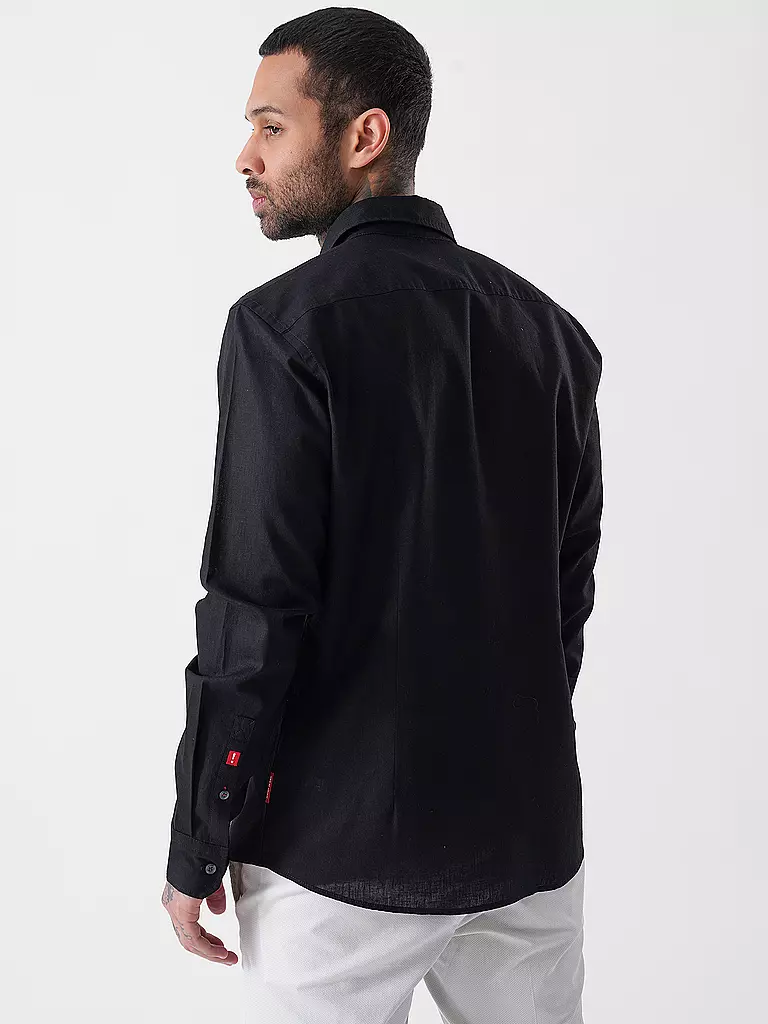 JOOP | Camicia slim fit HANSON
Marke: JOOP
Colore: nero
Categorie: Moda, Uomo

Lunghezza manica: Manica lunga
Materiale: Lino, Cotone
Forma colletto: Collo Kent
Motivo: Tinta unita
Vestibilità (capispalla): Slim
Stile: Smart Business
Dettagli: Mélange | Nero