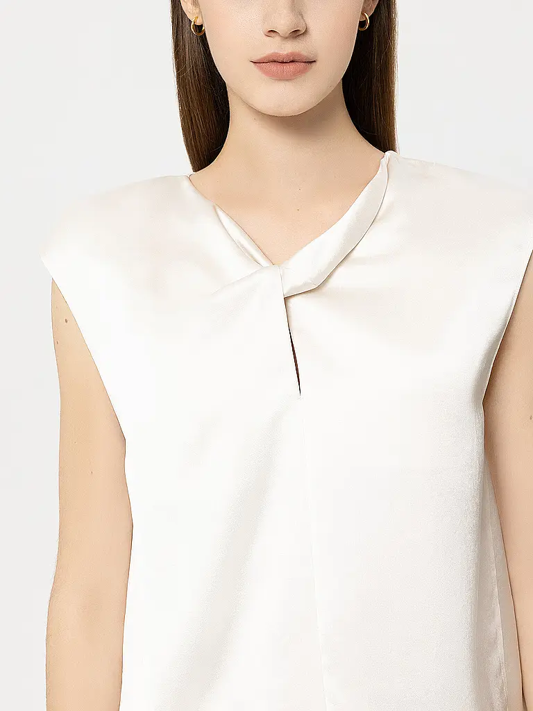 LUISA CERANO | Top | Crema