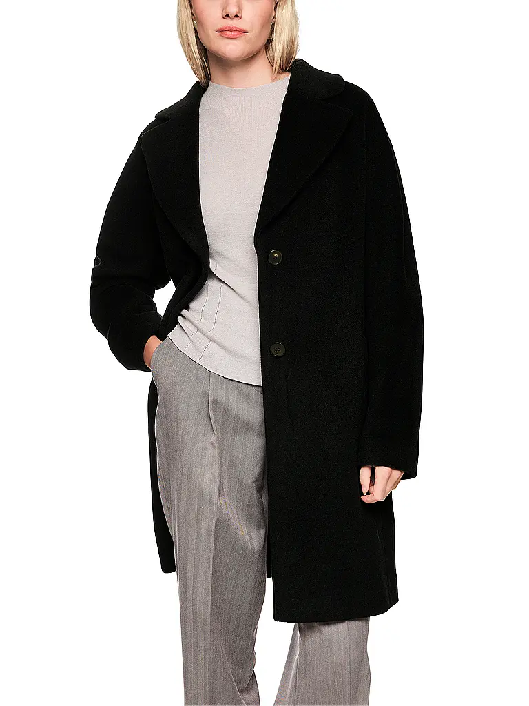 MARC CAIN | Cappotto di lana
Marca: MARC CAIN
Colore: nero
Categorie: Moda, Donna

Lunghezza manica: Manica lunga
Materiale: Alpaca
Tipo di colletto: Rever
Motivo: Tinta unita
Vestibilità (capispalla): Ampia
Stile: Glamour
Dettagli: Tasche a fessura | 