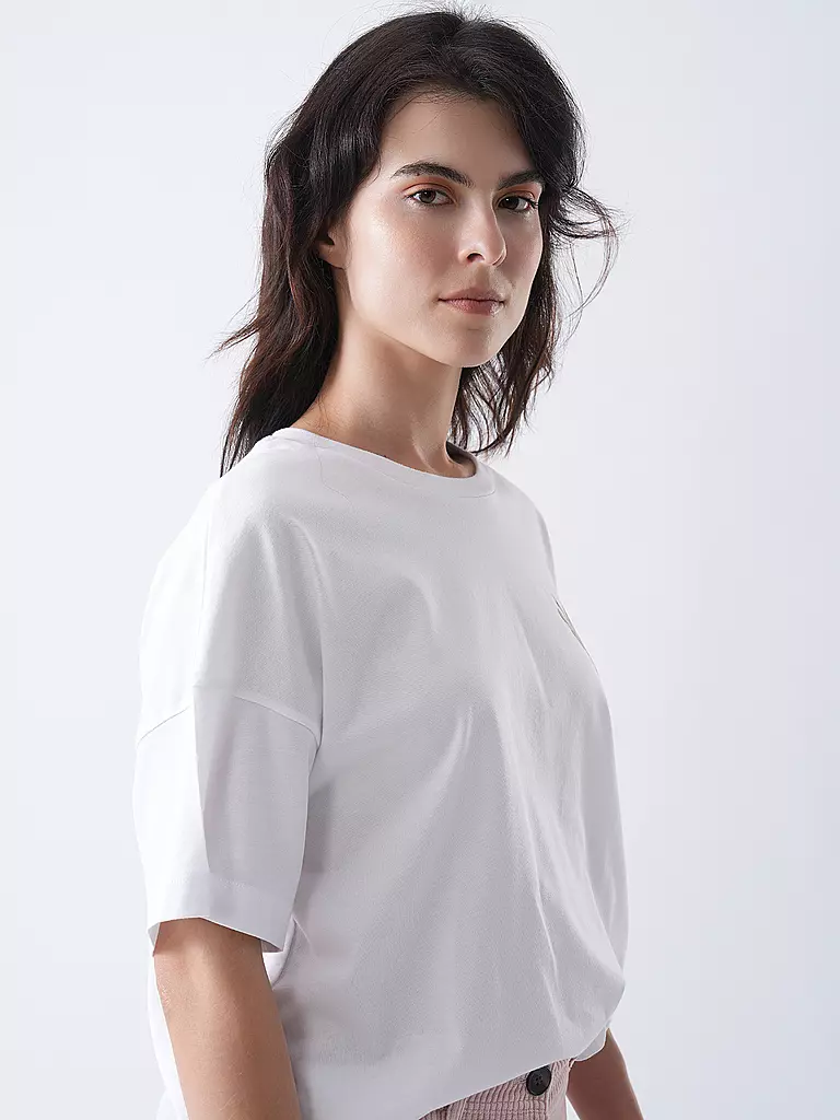MARC O'POLO | T-shirt
Marca: MARC O'POLO
Colore: weiss
Categorie: Moda,Donna

Lunghezza manica: Manica corta
Scollatura: Girocollo
Materiale: Jersey,Cotone
Motivo: Tinta unita
Vestibilità (capispalla): Ampia
Stile: Casual,Pure
Dettagli: Logo,Ricamo | Bianco