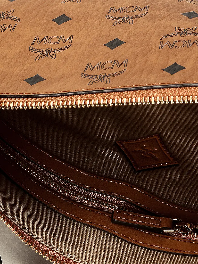 MCM | Nome prodotto: Borsa per cosmetici AREN IN VISETOS
Marca: MCM
Colore: marrone
Categorie: Moda,Donna

Materiale: Tela,Pelle
Motivo: Logo
Stile: Trendy | Marrone