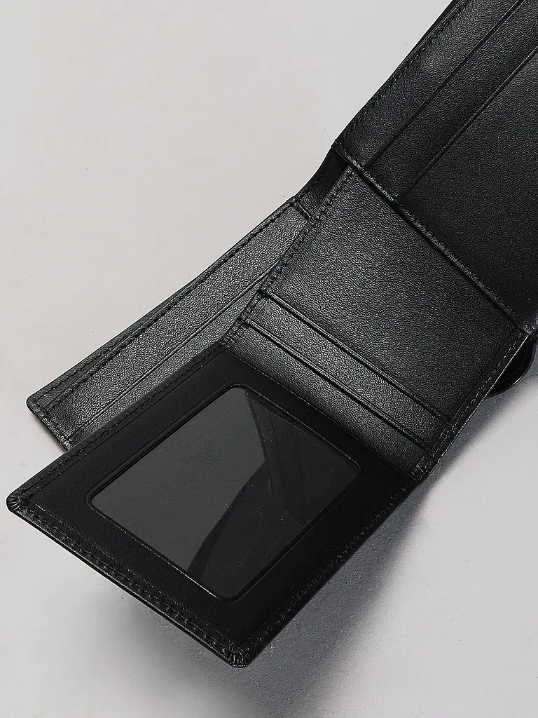 MCM | Nome prodotto: Portafoglio HIMMEL Small
Marca: MCM
Colore: nero
Categorie: Moda,Donna

Materiale: Pelle
Motivo: Tinta unita
Stile: Trendy | Nero