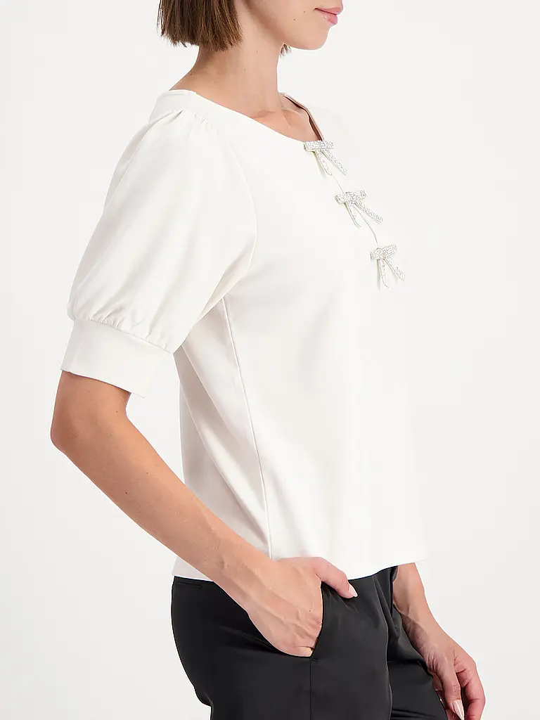 MONARI | T-Shirt
Marke: MONARI
Farbe: beige
Kategorien: Moda, Donna

Lunghezza manica: Manica corta
Scollatura: Girocollo
Materiale: Jersey, Viscosa, Stretch
Motivo: Tinta unita
Vestibilità (capispalla): Regular
Stile: Glamour
Dettagli: Strass | Beige