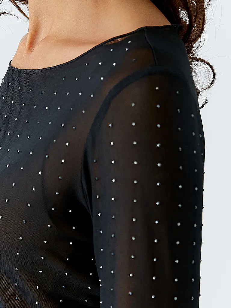 OUÍ | Maglietta a maniche lunghe
Marca: OUÍ
Colore: nero
Categorie: Moda,Donna

Lunghezza manica: Manica lunga
Scollo: Scollo a barchetta
Materiale: Jersey,Poliestere / Poliammide,Elasticizzato
Motivo: Tinta unita
Vestibilità (capispalla): Slim
Dettagli: Stra | Nero