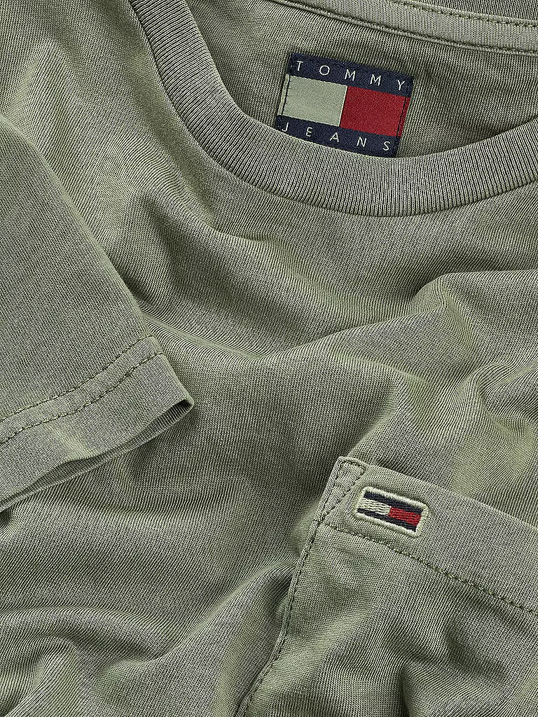 TOMMY JEANS | T-Shirt
Marke: TOMMY JEANS
Farbe: olive
Kategorien: Moda, Uomo

Lunghezza manica: Manica corta
Scollo: Girocollo
Materiale: Jersey, Cotone
Motivo: Tinta unita
Vestibilità (capo superiore): Regular
Stile: Young Fashion
Dettagli: Logo | 