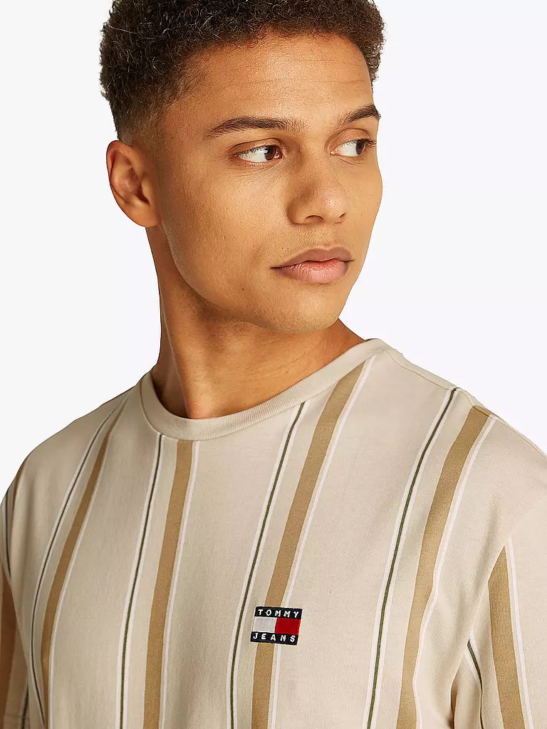 TOMMY JEANS | T-Shirt
Produktname: T-Shirt
Marke: TOMMY JEANS
Farbe: beige
Kategorien: Moda,Uomo

Ärmellänge: Manica corta
Ausschnitt: Girocollo
Material: Jersey,Cotone
Musterung: A righe
Passform (Oberbekleidung): Regular
Stil: Young Fashion
Details: Logo | 